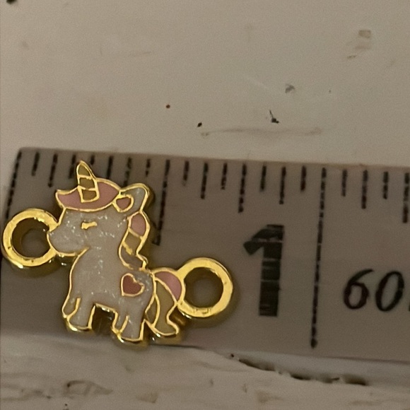 0.75” gold tone white pink enamel unicorn charm pendant with double jump hoop - Picture 8 of 9